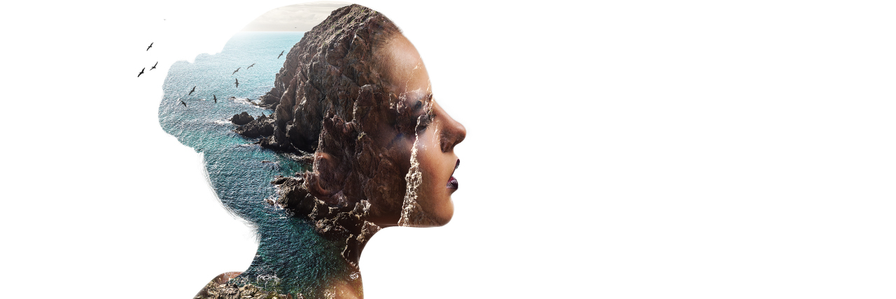 Trusting Myself After Becoming Disabled Silhouette of a woman combined with a rocky coast and sea. Double exposure.