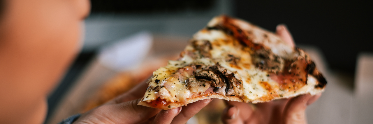 The Value of Familiar Places When Chronically Ill Woman eating pizza at night.