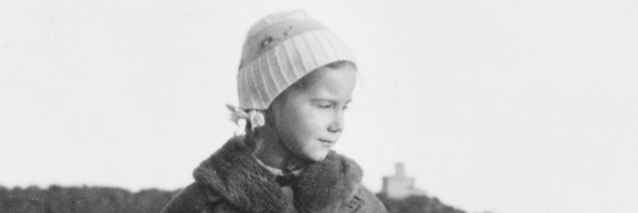 Growing Up With Undiagnosed Autism in the 1950s Portrait of young girl in 1957, black and white photography.