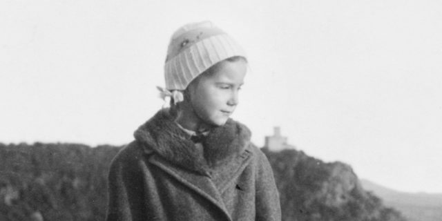 Portrait of young girl in 1957, black and white photography.