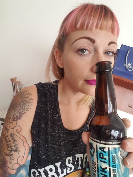 woman selfie with beer bottle