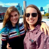 the author and her partner smiling outside in Melbourne