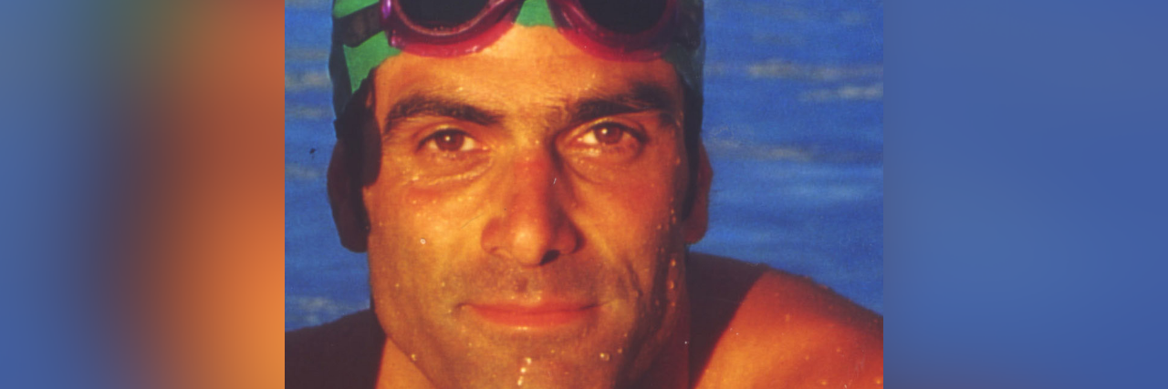 Remembering My Loved One 4 Years After He Died by Suicide Steve in a pool wearing his swimming cap