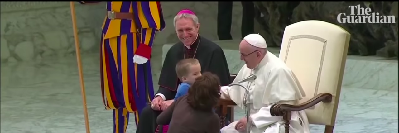 Pope Shows Kids With Disabilities Have a Place in Church Pope Francis and a cardinal meet Wenzel and his mother.