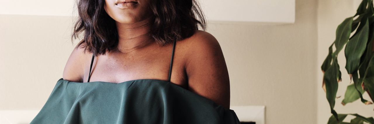 Read This If You Are a Veteran, Suicidal and Need Help photo of woman a home close up so most of face is hidden and her hands are on her lap