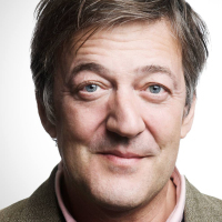 actor and comedian stephen fry isolated against white background