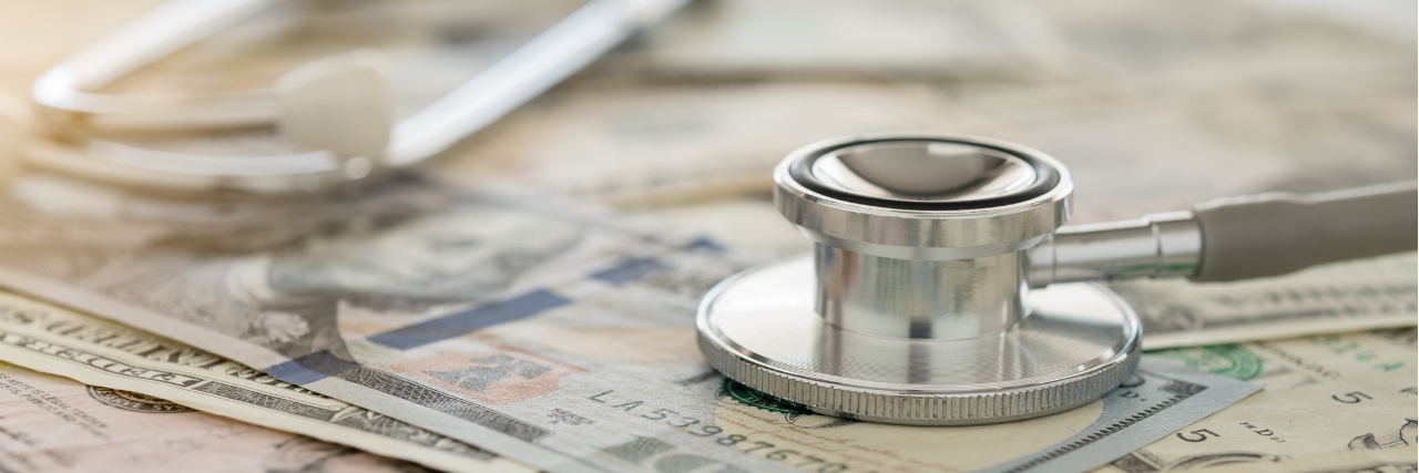 5 Ways Nixing the ACA Could Upend the Entire Health System Stethoscope laying on top of money