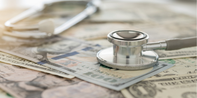 5 Ways Nixing the Affordable Care Act Could Upend the Entire Health System Stethoscope laying on top of money