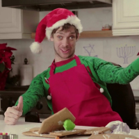 Zach Anner makes a gingerbread house.