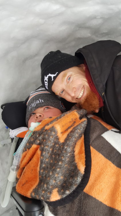 Eichhorn with son Elijah inside the igloo