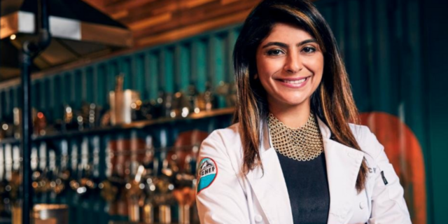 Fatima Ali smiling, wearing 'Top Chef' jacket