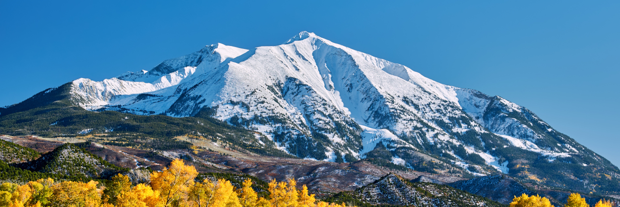 Moving Mountains: Overcoming Challenges With Adrenal Insufficiency Mount Sopris autumn landscape in Colorado. Rocky Mountains, USA.