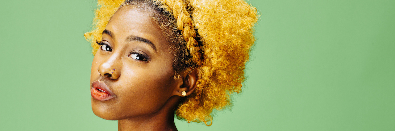 What Helps Bipolar Disorder Recovery Besides Medication A woman looking at the camera