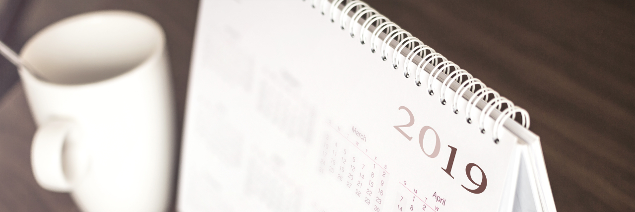Tips for the New Year If You Have a Disability Desktop calendar sitting on desk showing year 2019.