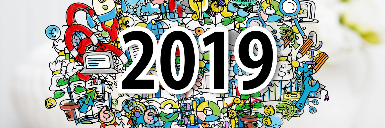 2019 with drawings in background.
