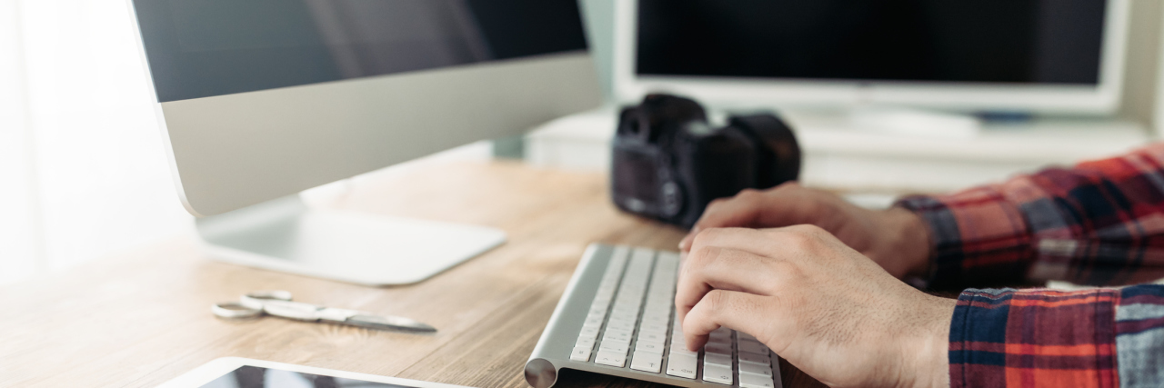 What to Remember When Discussing Alternative Mental Health Treatments man typing on computer