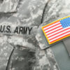 USA flag and U.S. ARMY patch on American soldier's uniform