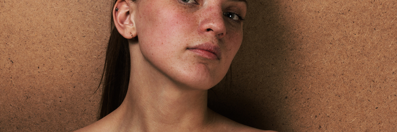 A woman with a scar on her chest
