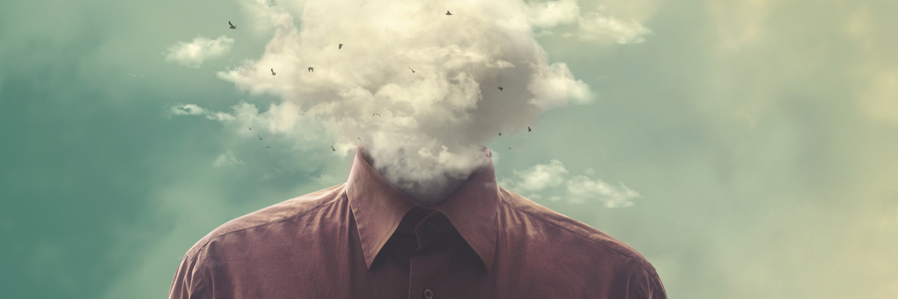 What It's Like to Deal With Negative Thoughts All Day A man with clouds over his head