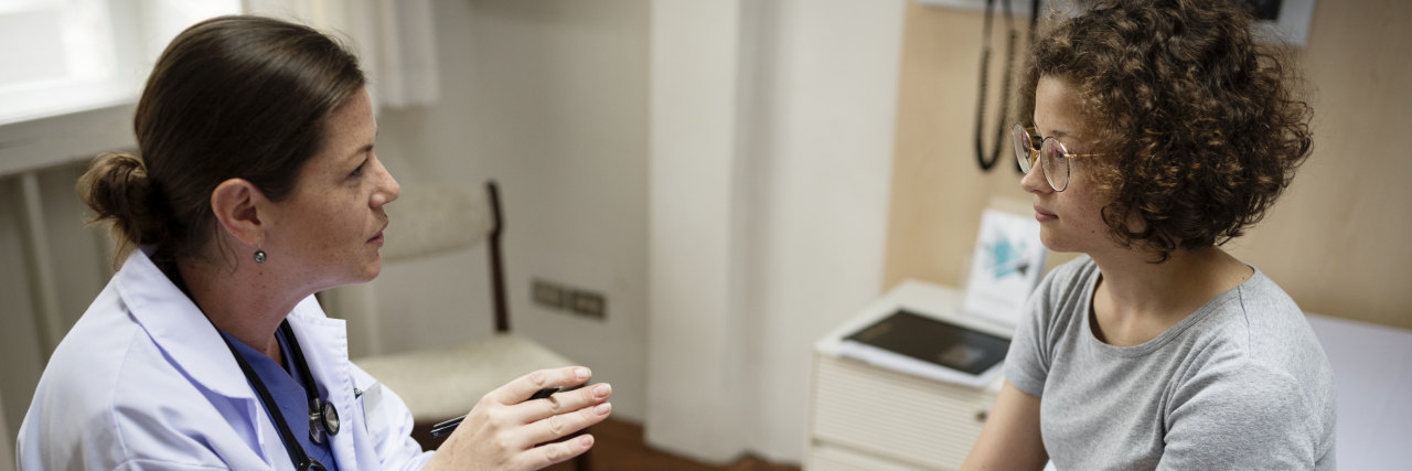 When My Symptoms Started Female doctor talking to a female patient.