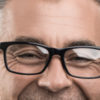 Close-up of man wearing glasses.