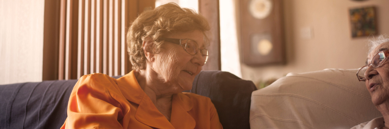 Should You Visit a Friend Who May Not Remember Your Visit? Portrait of woman talking at home.