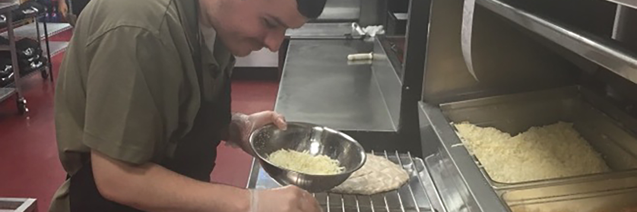 Preparing for the Future When Your Child Has Autism Nicole's brother making pizza at work.