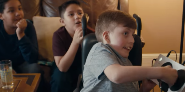 Microsoft Highlights Xbox Adaptive Controller in Its Super Bowl LIII Commercial Owen playing with the Xbox Adaptive Controller while his friends watch.
