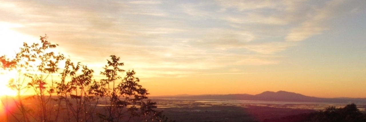 The Importance of Home When You Are Chronically Ill sunset view from her house