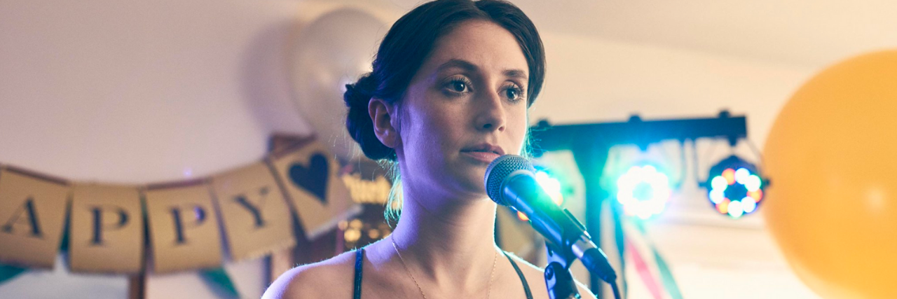 U.K. Channel 4 Premieres 'Pure' Drama Series about OCD Charly Clive as Marnie in "Pure." She's wearing a blue crushed velvet dress.