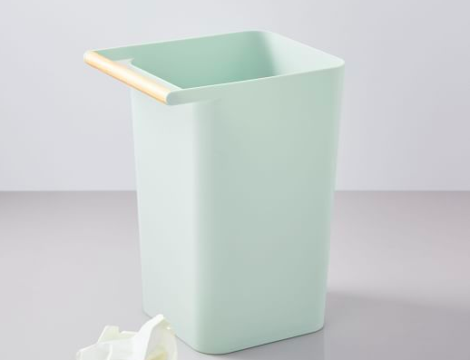 mint green trash can