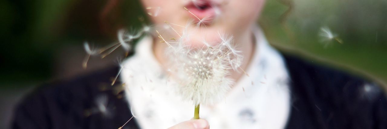 Borderline Personality Disorder and Constantly Changing Hobbies woman wearing sunglasses blowing weed and making a wish