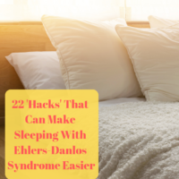 Bed with words 22 'Hacks' That Can Make Sleeping With Ehlers-Danlos Syndrome Easier