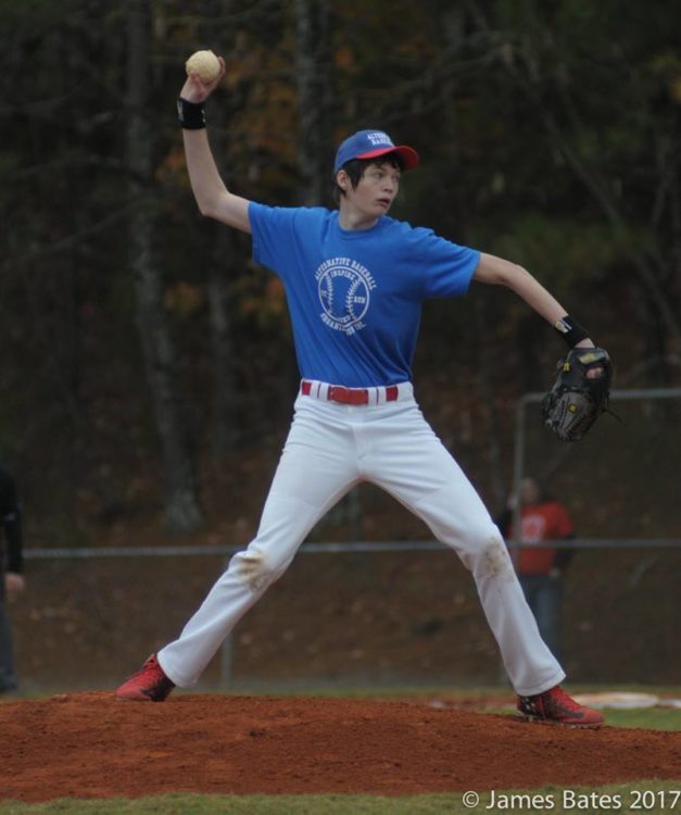 Guy throwing ball