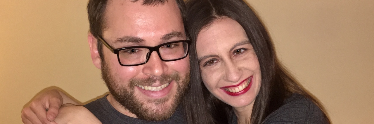 Finding a Supportive Partner When Dating With a Disability Louis and Kelly embracing while wearing their Mighty t-shirts.
