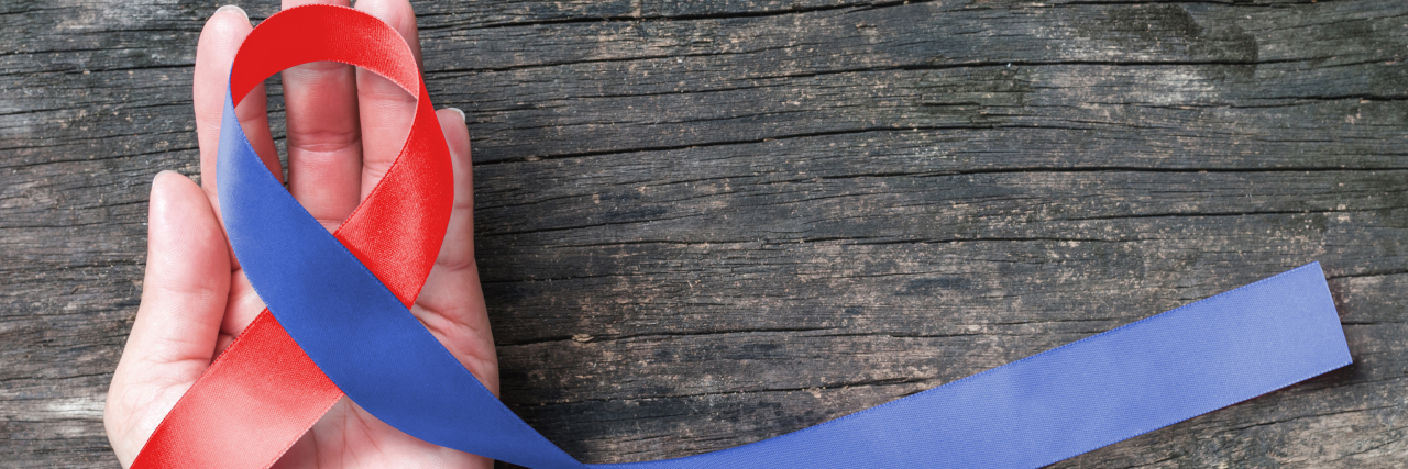 The Important Bond Shared Between CHD Parents red and blue CHD ribbon