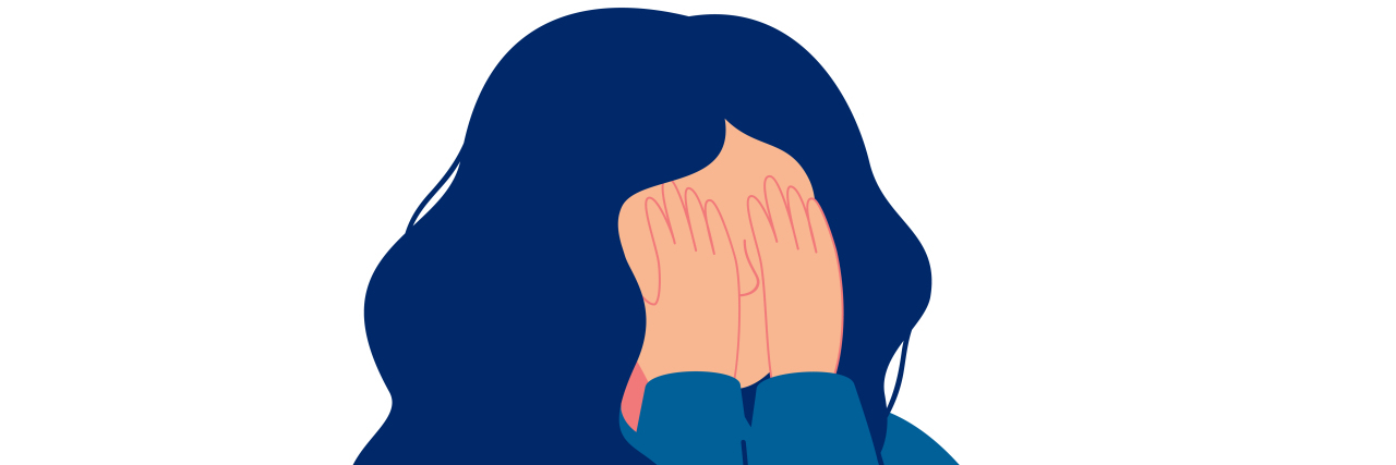 Depressed young girl crying covering her face with her hands