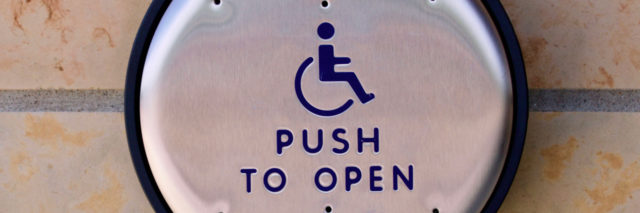 Disability accessible door opener button.
