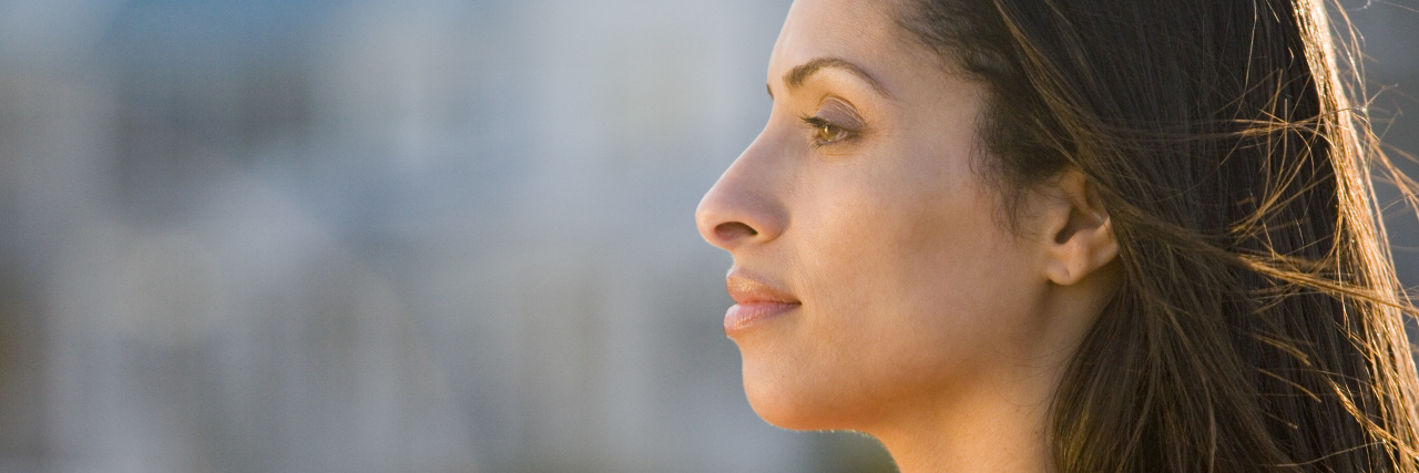 Thoughts on Being 38 and 'Childless' side profile of Woman outdoors