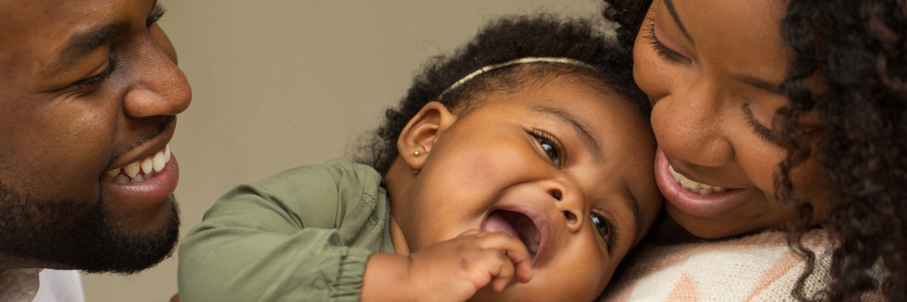 The Lessons You Learn As a Parent With a Chronic and Rare Condition Mother and baby daughter smiling