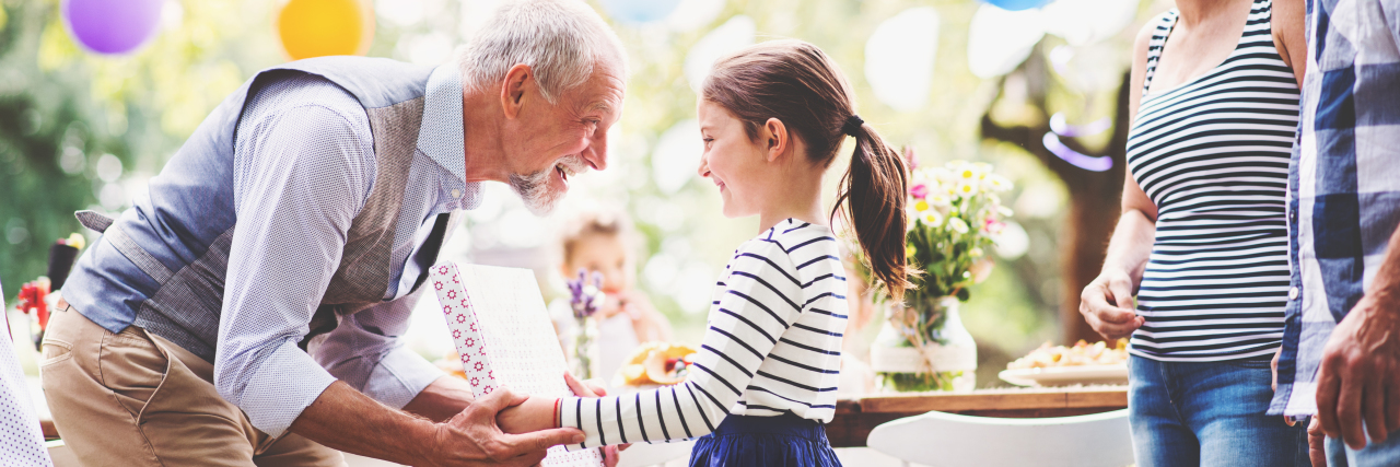 My Family and Friends Support My Child's Food Allergies a family celebrating at an outdoor party