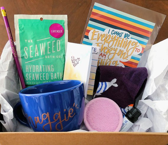 box filled with cups letters and cards