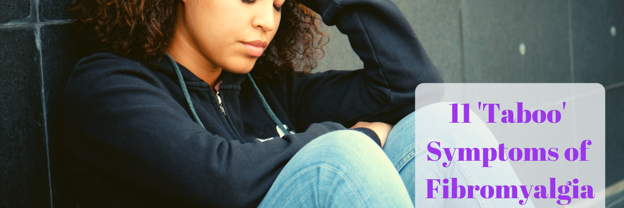 11 'Taboo' Symptoms of Fibromyalgia Woman sitting against a wall with words "11 'Taboo' Symptoms of Fibromyalgia"