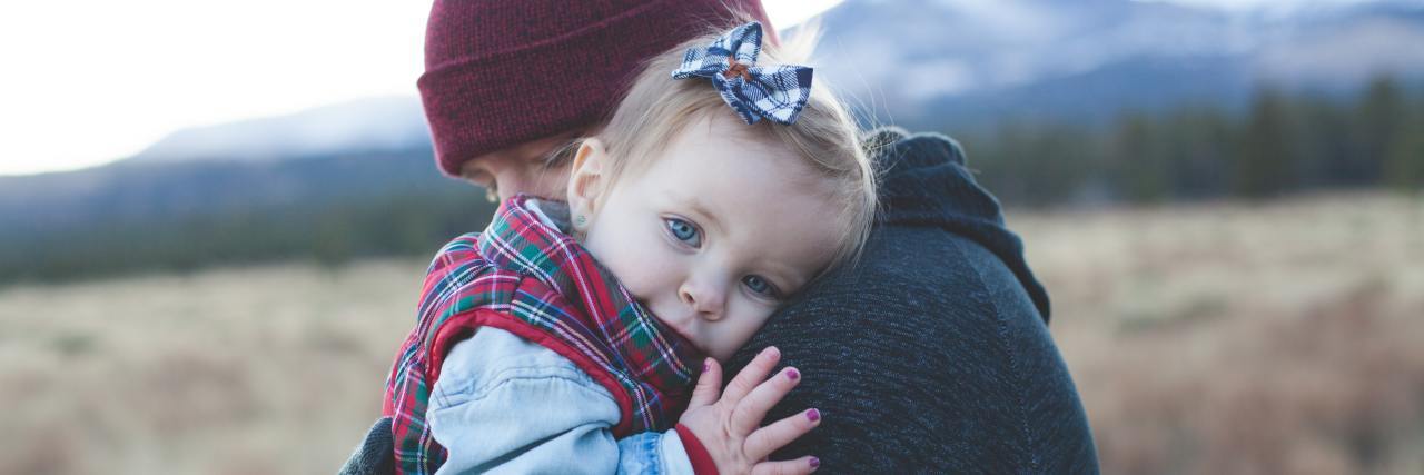 How to Cope With Feelings of Sadness or Grief man holding baby