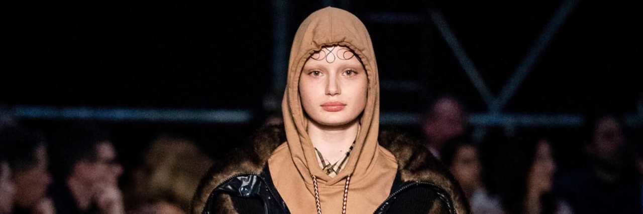 Model Liz Kennedy Calls Out Burberry Hoodie for Its Suicide Imagery Model wearing Burberry hoodie with imagery that could be interpreted as a reference to suicide