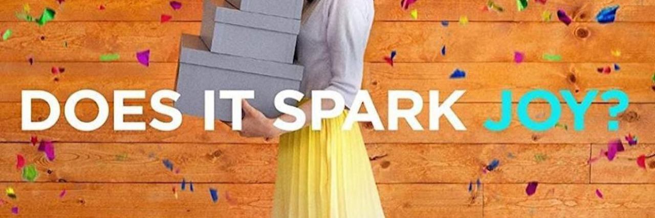 Integrating Marie Kondo's 'Tidying Up' Into My Medical Mama Lifestyle Marie Kondo holding two boxes