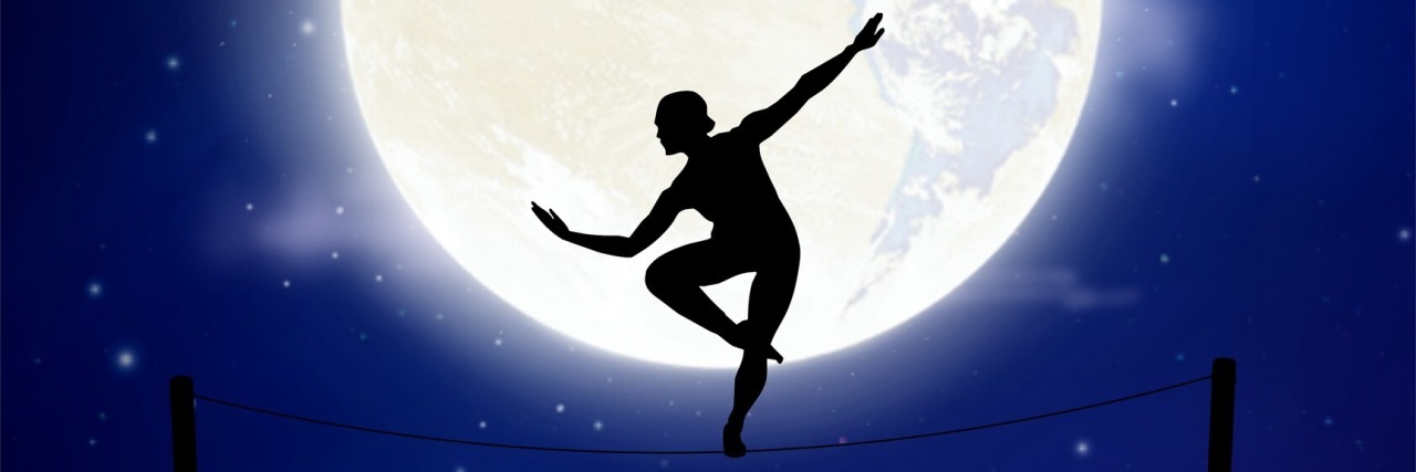 illustration of a tightrope walker in front of a full moon at night