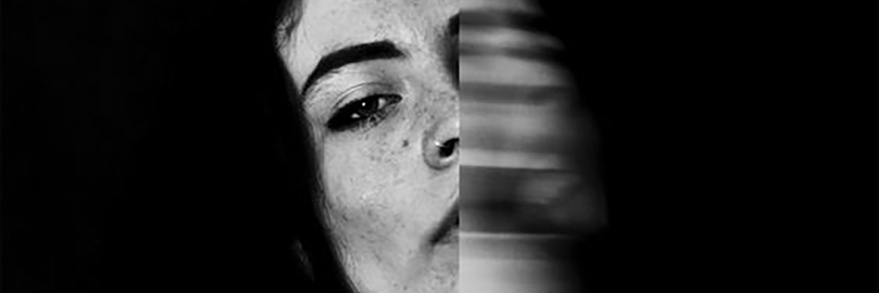 Being an Anxious Autistic Person Black and white image of woman with one half blurred.