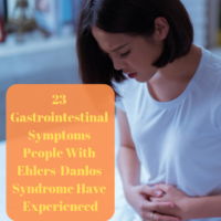 Woman holding stomach with words "23 Gastrointestinal Symptoms People With Ehlers-Danlos Syndrome Have Experienced"