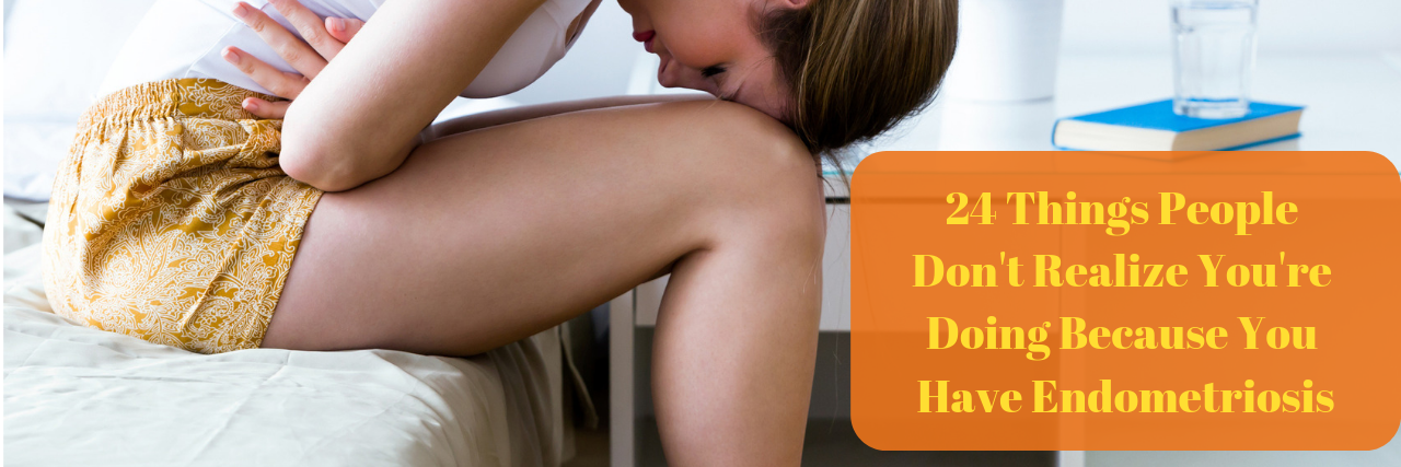 24 Things People Don't Realize You're Doing Because of Endometriosis Woman hunched over with words "24 Things People Don't Realize You're Doing Because You Have Endometriosis"